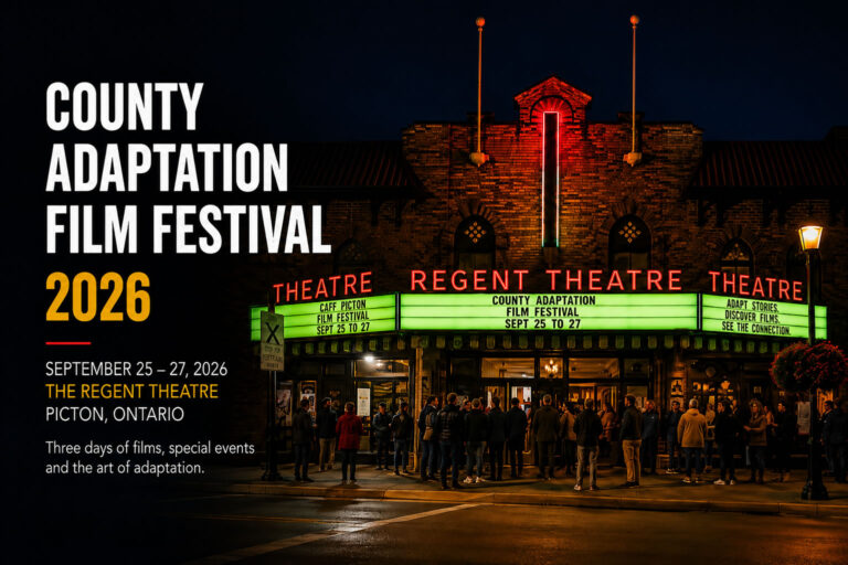 Nighttime poster announcing County Adaptation Film Festival 2026 with a crowd outside the Regent Theatre in Picton, Ontario and festival details on the left side viewable in large white text and orange 2026 numerals.