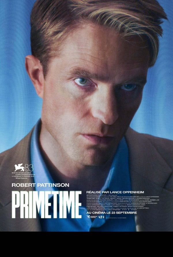 Close-up portrait of Robert Pattinson on a blue-toned movie poster for Prime Time, with credits and title text visible of the film.